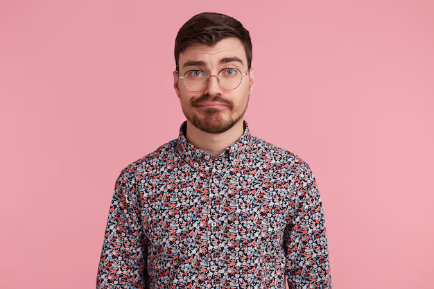 files/close-up-displeased-young-bearded-man-glasses-wearing-colorful-shirt-isolated-pink-background-looking-camera-with-raised-eyebrow-people-emotions-concept_295783-2777.avif
