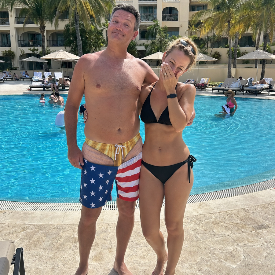 Couple at the pool, man wearing printed swim trunks